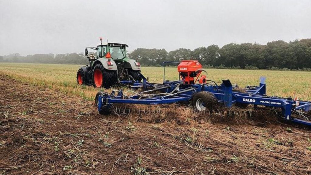 surface tillage machine dragged by tractor on farm